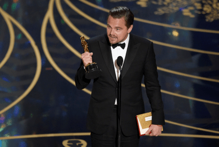 Finally! DiCaprio collects a golden statue for his role in The Revenant